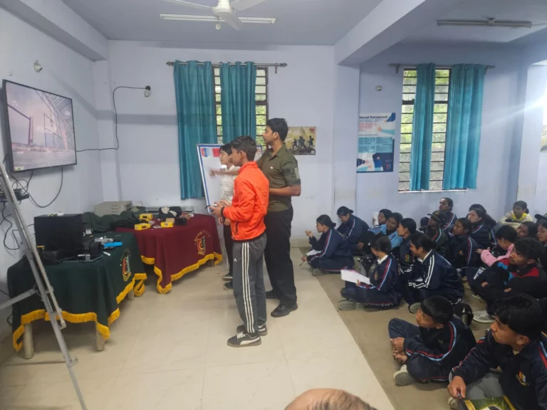 Instructor briefing seated NCC cadets during the FPV flight training session at Gangtok