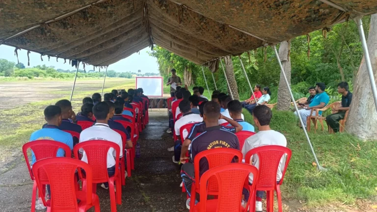 NCC cadets seated under a camouflage tent during a drone briefing at Kancharapara Air Force Station