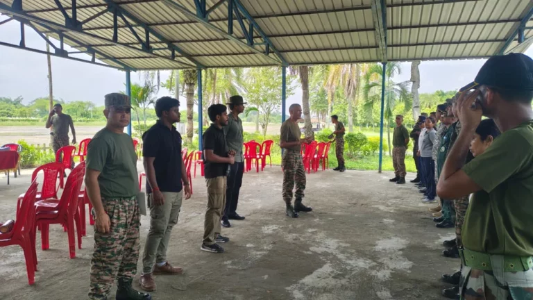 Officers and trainers gathered at the airfield shelter during the event