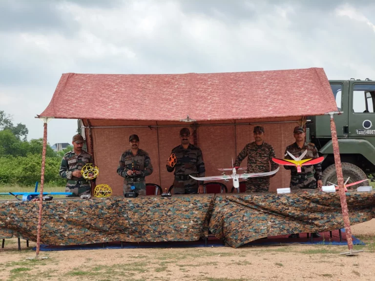 Army personnel with a VTOL and fixed-wing UAV displayed at the Ranchi army unit